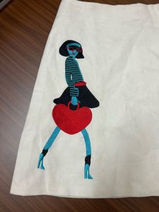 white skirt with a doll