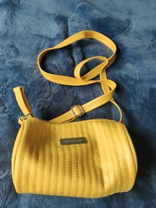 Circular Sides Stylish Mustard Sling Bag