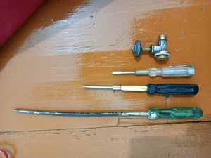 3 Different Size Screwdrivers And Joint