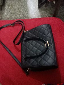 Pure Leather Black Handbag.