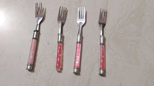 Set Of Frocks And Spoons