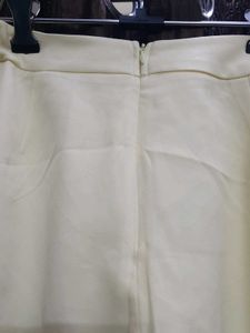 Yellow Ruffle Hem Flare Pants