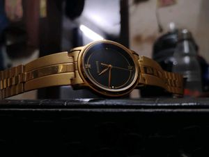Sonata Gold Watch