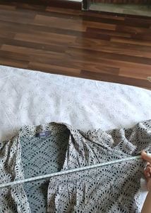 Grey Shrug