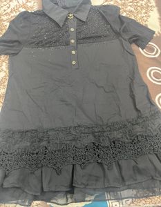 black frill top