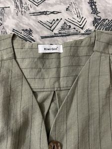 Shirt Style Top With Short To Medium Length