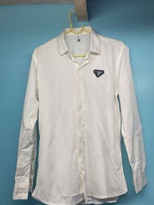 Elegant Minimalism: Prada White Triangle Logo Shir