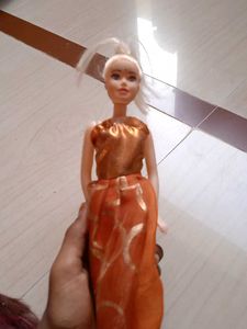 Barbie Doll in Orange Dress
