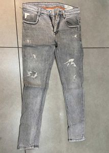 Distressed Gray Denim Jeans