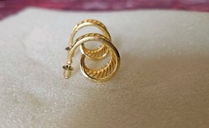 Gold-Plated Leaf Hoops from Adore By Priyanka