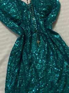 green sequined dress