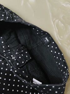 A beautiful black hipster shorts with polka dots.