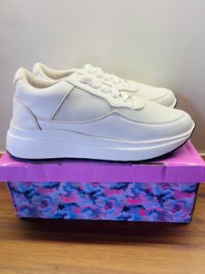 White sneakers branded new