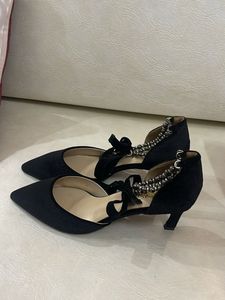 Black Heels with Silver Embellishments