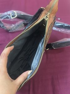 Coach Clutch sling Bag