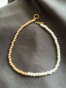 pearl chain and snake ring
