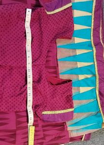 Saree In Multi Colour With Golden Lace.
