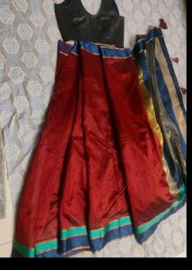 Maroon Saree With Sleevless Blouse
