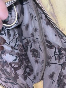 Floral pearl embellished purse