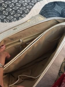 Elegant Off-White Clutch