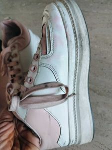 good white color sneaker shoes
