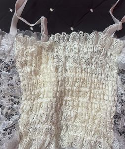 Delicate White Lace Cami with Pearl Buttons