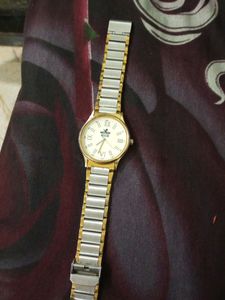 Men Wrist Watch Gold Border And Silver  Chain Colo
