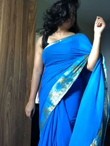Elegant Blue Saree with Gold Border