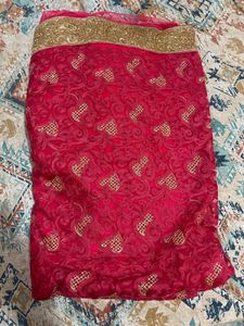 Hot Pink Embellished Net Saree