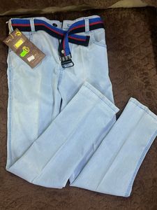 Light Wash Jeans with Striped Belt