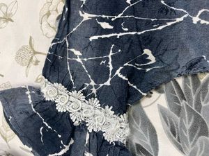 A Very Beautiful Top With Flower Detailing