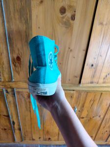 Turquoise Converse All-Stars