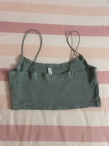 green tank top