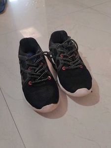 Black athletic running shoes