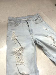 Ripped Light Wash Denim Jeans