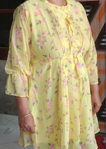 A flowing beautiful Yellow Color western dress