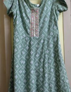 A Green Frock Type Top With Size XXL