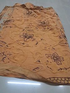 Elegant Peach Saree with Gold Embellishments