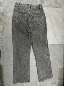 Straight legged ripped jeans