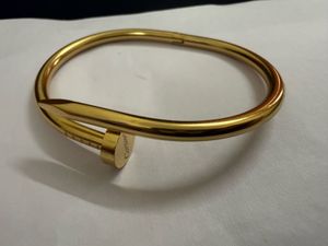 Cartier - Gold Nail Bangle