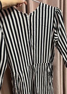 Bold Striped Jumpsuit with Statement Orange Detail