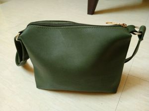 A Green Cute Sling Bag For Daily Use