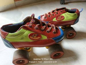 Used 7-9 Years Roller Skates & Safety Kit Includes