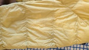 Uniqlo ultra light down jacket in butter yellow