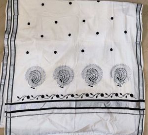 Kasuva Saree with black and silver bold border .