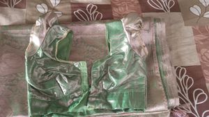 A Beautiful Light Green With Pink Shade Silk Saree