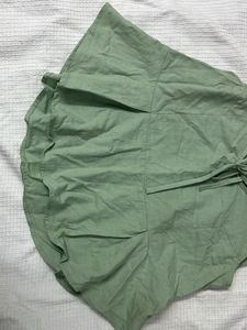 Flared Pista Green Sleeveless Top