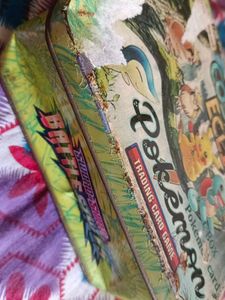 Cosmic Eclipse Pokemon Tin