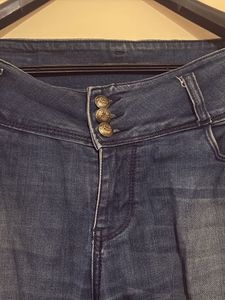 Ripped Blue Denim Jeans