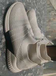 Worn White Casual Shoes